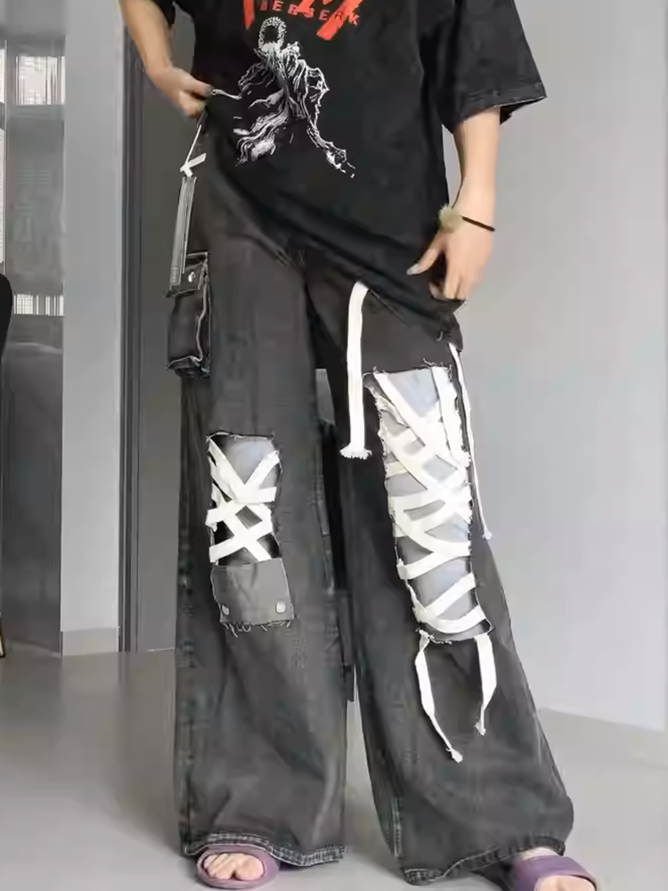 ストラップリップドデニムパンツ